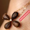 Dây chuyền trầm hương hình hoa mai hạt kỳ nam
