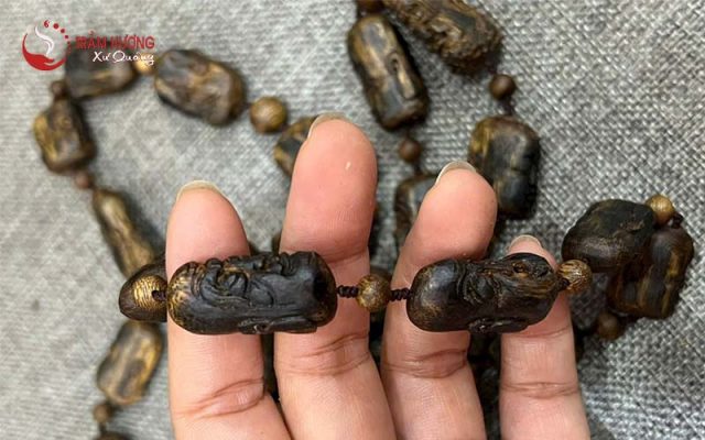 Dây chuyền Kỳ Hải Nam hình 12 vị La Hán